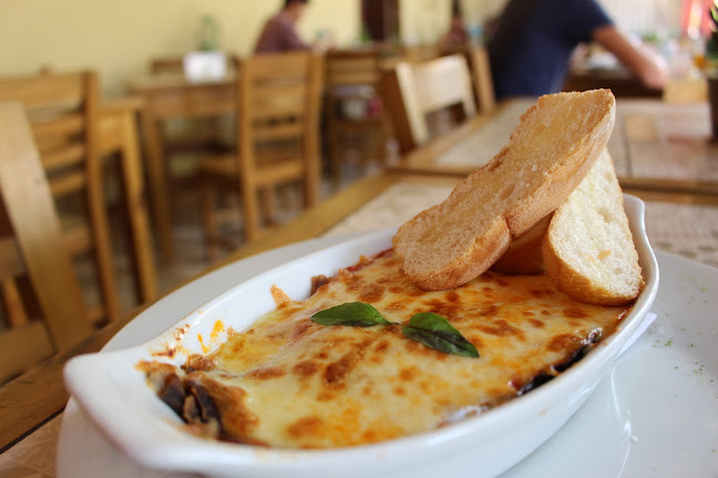 Wild Olive Trattoria & Guest House - Gastronomía y hostelería