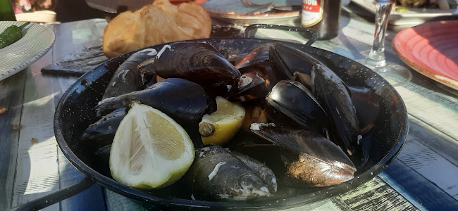 Comentarii opinii despre Qué Rico Restaurante Playa de San Juan