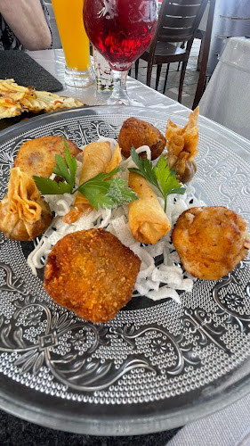 Qué Rico Restaurante Playa de San Juan - Santa Ana