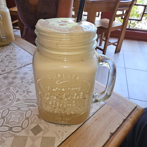 Wild Olive Trattoria & Guest House - Gastronomía y hostelería