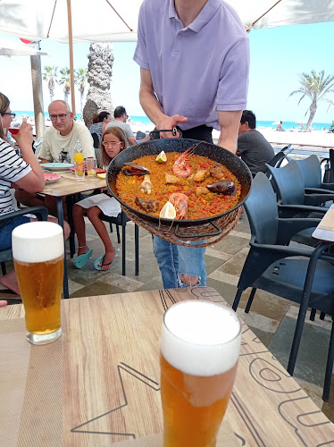 Comentarii opinii despre Qué Rico Restaurante Playa de San Juan