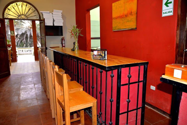 Wild Olive Trattoria & Guest House - Gastronomía y hostelería