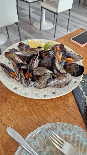 Qué Rico Restaurante Playa de San Juan - Santa Ana
