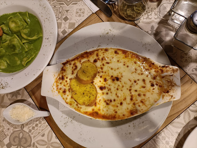 Wild Olive Trattoria & Guest House - Gastronomía y hostelería