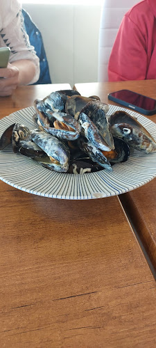 Opinii despre Qué Rico Restaurante Playa de San Juan în Santa Ana - Gastronomía y hostelería