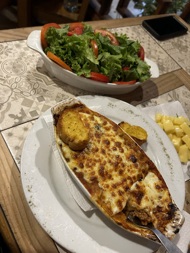 Wild Olive Trattoria & Guest House - Gastronomía y hostelería