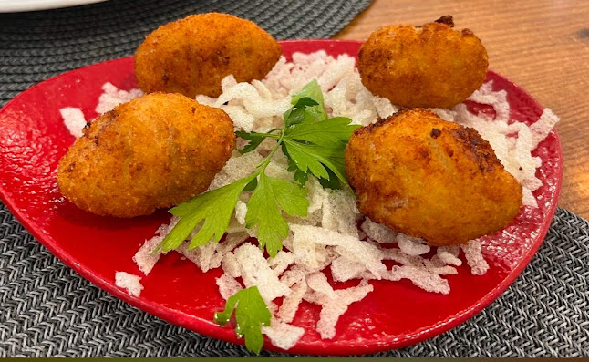 Qué Rico Restaurante Playa de San Juan